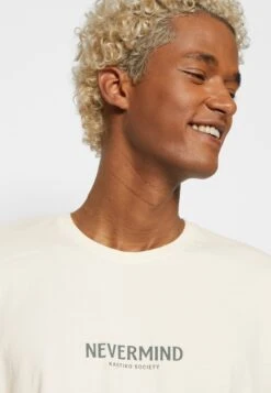Kaotiko Nevermind Unisex - Camiseta Estampada - Ivory -Kaotiko Tienda d11556d7b2c246ec9b500e64d592ebbf